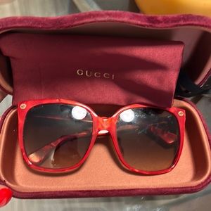 Women’s red Gucci sunglasses